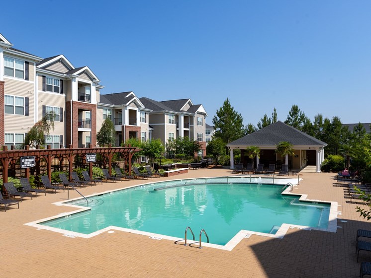 Swimming Pool With Relaxing Sundecks at Abberly Village Apartment Homes by HHHunt, West Columbia